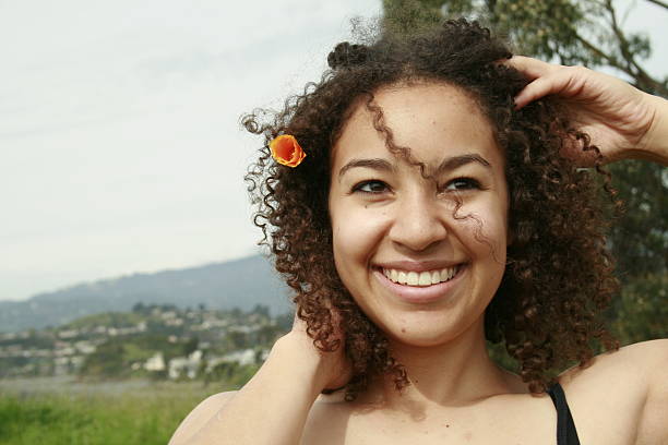 istock Curly Girl with Flower 182700005
