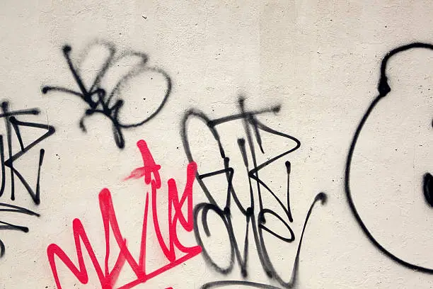 graffiti and tags on a wall in New York City