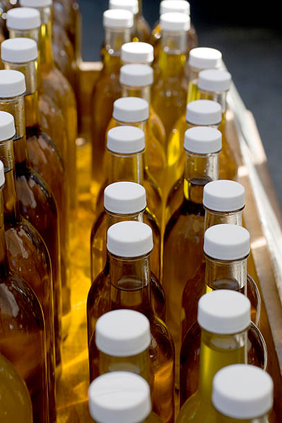 istock Farmers Market: Bottles of Olive Oil 182700564