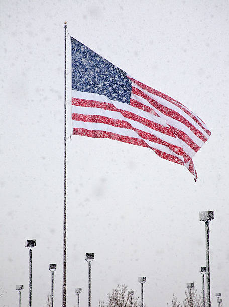 istock American Flag in Snowstorm 182700824