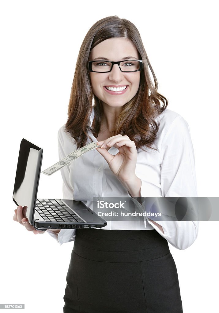 Mujer de negocios feliz sosteniendo portátil y moneda de papel en blanco - Foto de stock de Felicidad libre de derechos