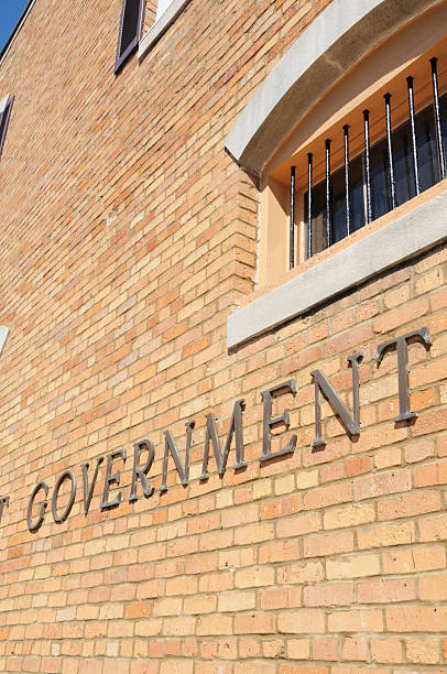 istock Government sign with barred window 182701987