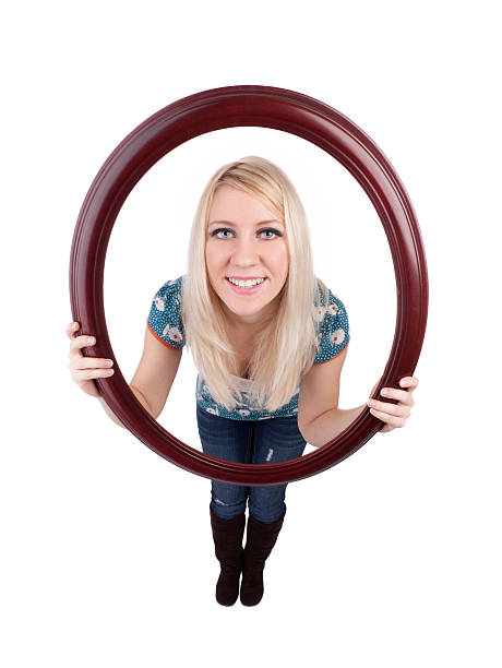 istock Beautiful Young Woman Holding Frame 182702661