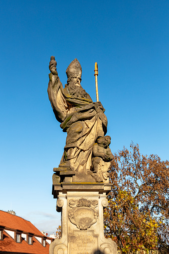 Statue of Augustine of Hippo on Charles Bridge in Prague, Czech Republic