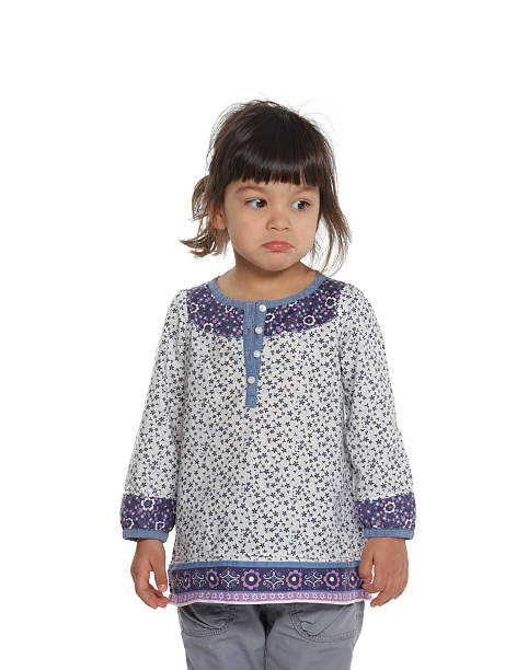 istock sad little girl 182702991