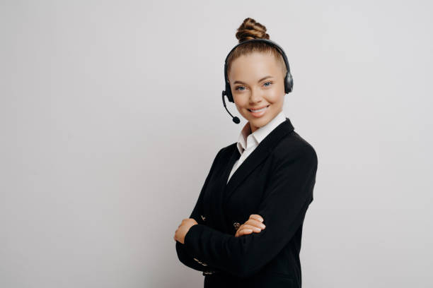 istock Efficient call center worker in a headset, embodying friendly customer service and professionalism 1827031357