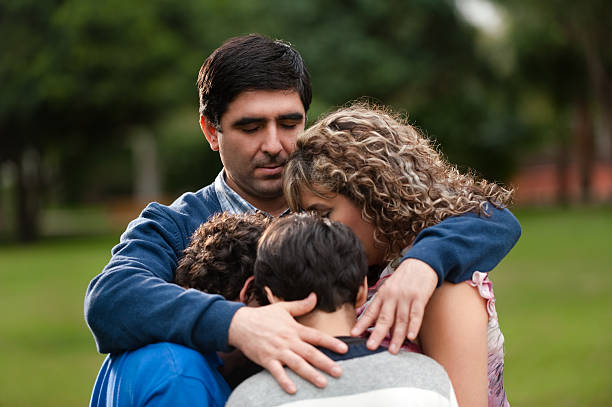 istock Father protecting his family 182703161