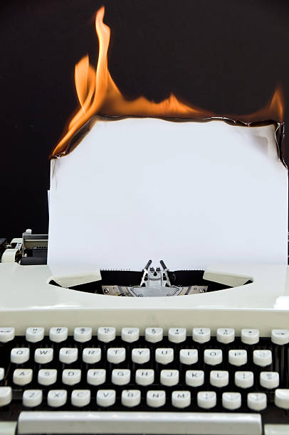 istock Retro Typewriter With Burning Paper ... Full Keyboard 182703430
