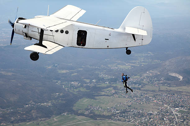 istock Parachutist jump from a plane 182705484