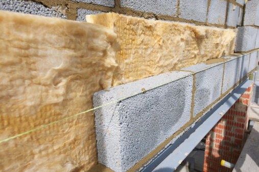 Wall construction showing cavity wall insulation built to UK code