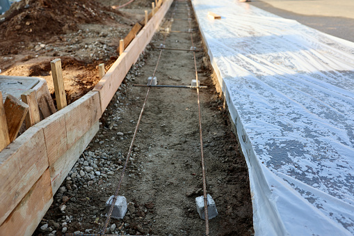Concrete forms to create the new foundation