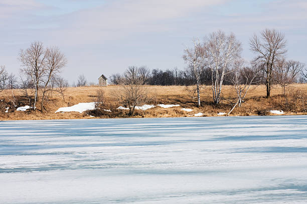 istock Outhouse on a Hill by Lake in Spring 182705921