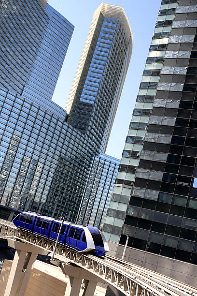 istock Modern Hi Rise Building With Blue Tram 182706007