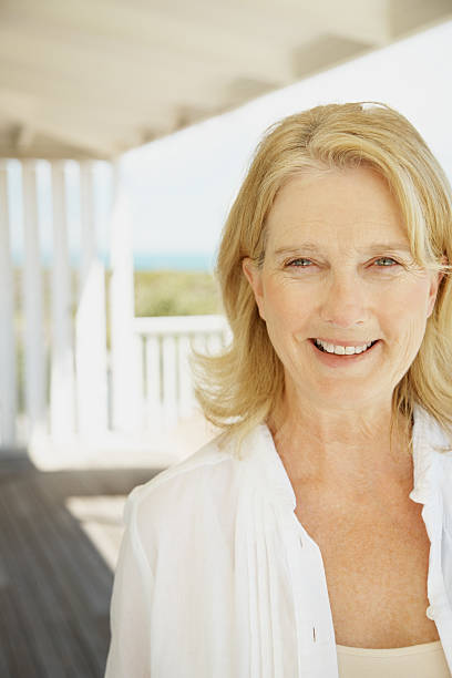 istock Portrait of a smiling mature lady 182706280