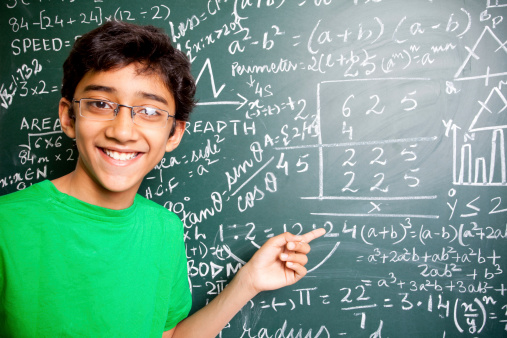 Cheerful Indian Boy/Student with Mathematics Problems