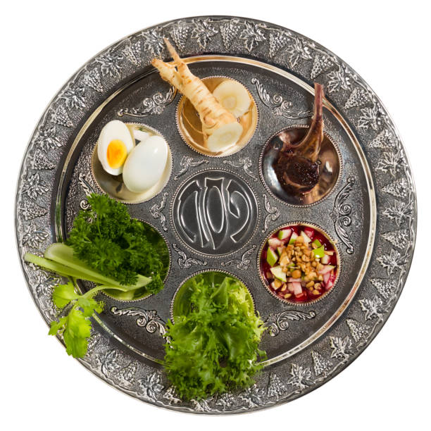 Seder plate with traditional food isolated stock photo