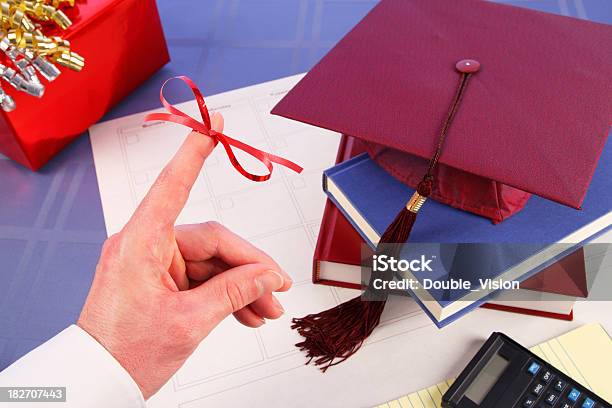 Dont Forget Finger Ribbon Graduation Cap Books Gift Stock Photo - Download Image Now