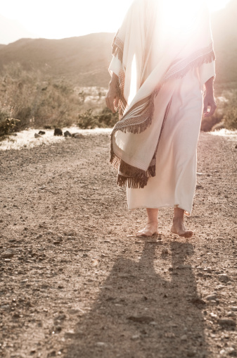 Light radiating from a man representing Jesus as he walks. Similar Images: