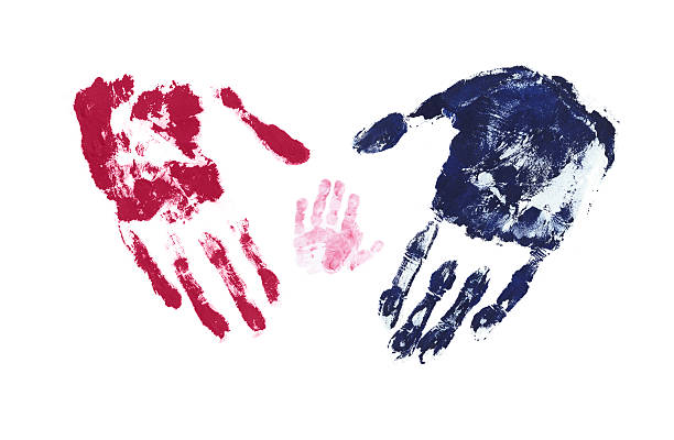 Adult And Baby Hand Prints stock photo