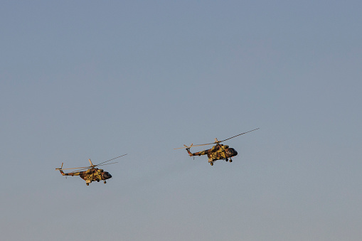 Belgrade, Serbia - September 8, 2023: Serbian  military transport helicopters MI- 17V -5 in the sky above Belgrade in a training flight