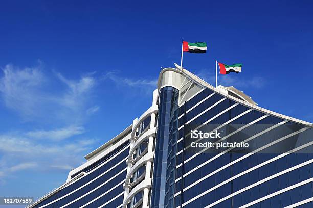 Uae Flags On Building Stock Photo - Download Image Now - United Arab Emirates Flag, Dubai, All Middle Eastern Flags