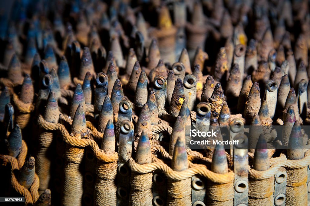 Old rusty cartridge background Old rusty ammunition background Ammunition Stock Photo