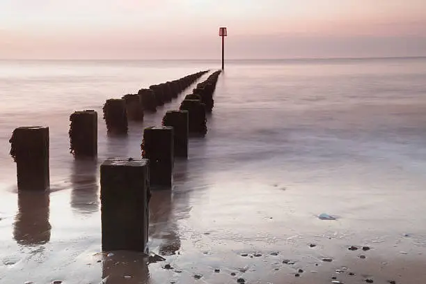 A breakwater at first light on the North Beach at Bridlington, East Yorkshire, England.
