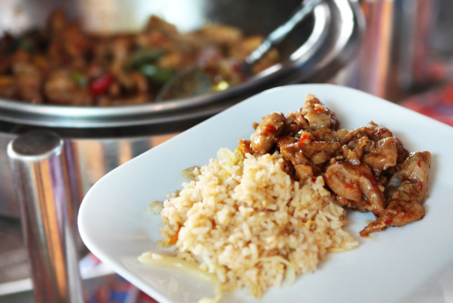 plate of Asian cuisine chicken and fried rice at a buffet..More FOOD And Table Setting images: