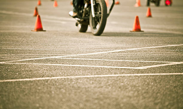 Motorcycle safety course Motorcycle training. Shot with 5DII, short depth of field, focus on foreground. bike workshop stock pictures, royalty-free photos & images