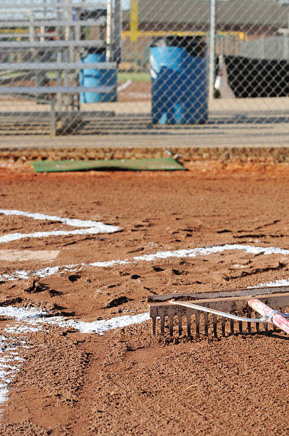 istock Rake near home plate on baseball infield 182708060