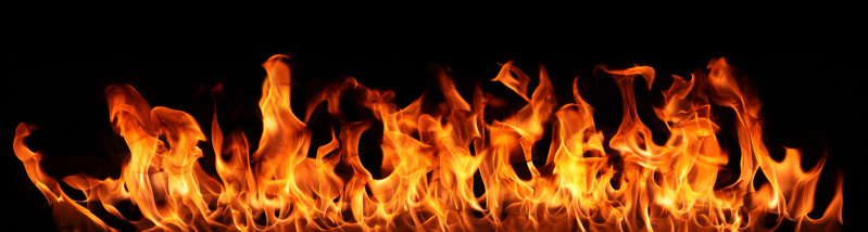 Closeup of burning wood with flames