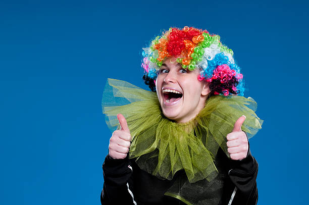 istock clown woman making OK 182708454
