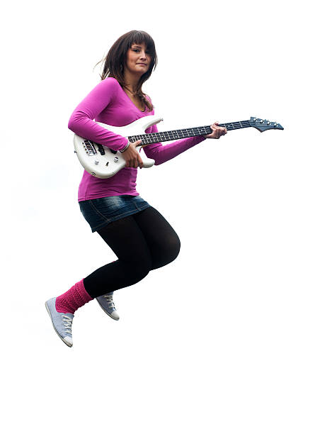 istock Young woman jumping with guitar 182709054