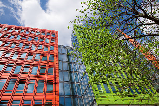 istock Contemporary office buildings with tree in foreground 182709177