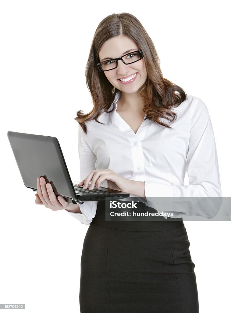 Felice donna d'affari utilizzando un computer portatile su bianco - Foto stock royalty-free di Abbigliamento elegante
