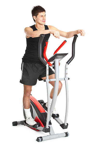 istock young man in sport clothing making exercises 182709558
