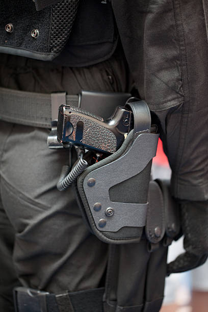 istock Police officer with gun 182709611