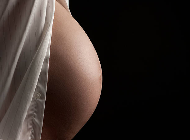istock Pregnant woman abdomen 182709730