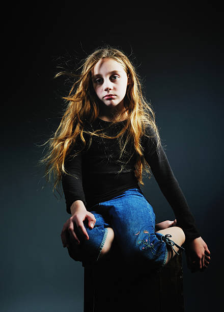 istock Beautiful young girl with intense gaze 182709948
