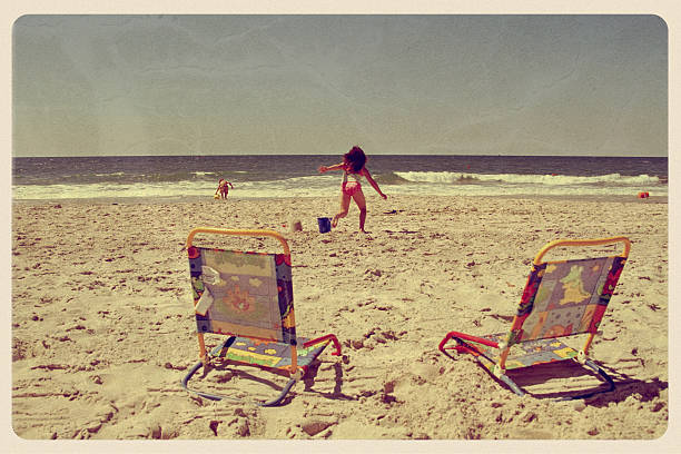 istock Kids Playing on the Beach - Vintage Postcard 182710031
