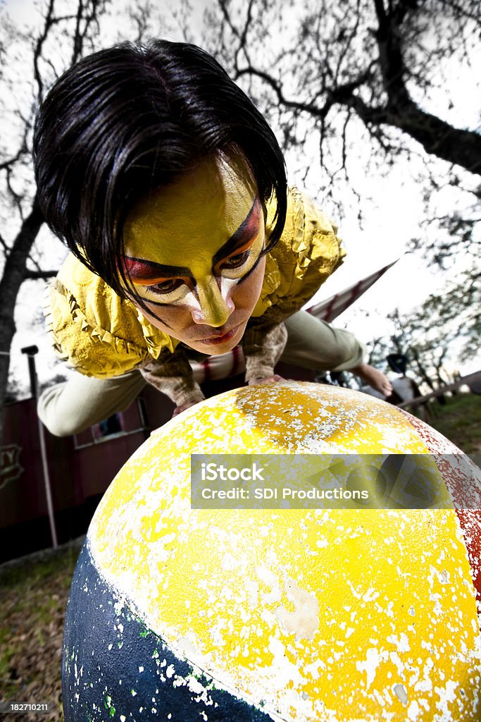 Circus Balance Performer On A Large Ball Stock Photo - Download Image