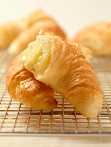 Croissants with Melting Butter on Cooling Rack -Photographed on Hasselblad H3D2-39mb Camera