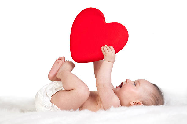 heart shape of the baby's hand stock photo