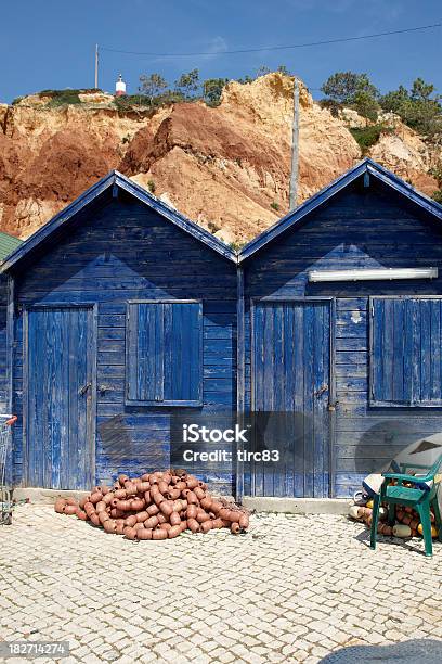 Blue Wooden Portugese Fishermens Huts Stock Photo - Download Image Now - Beach, Blue, Cultures