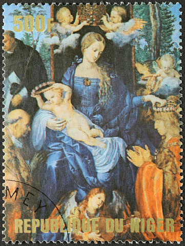 the Adoration of Jesus on a postage stamp