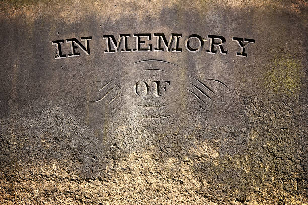 istock 'In Memory Of' worn gravestone 182715000