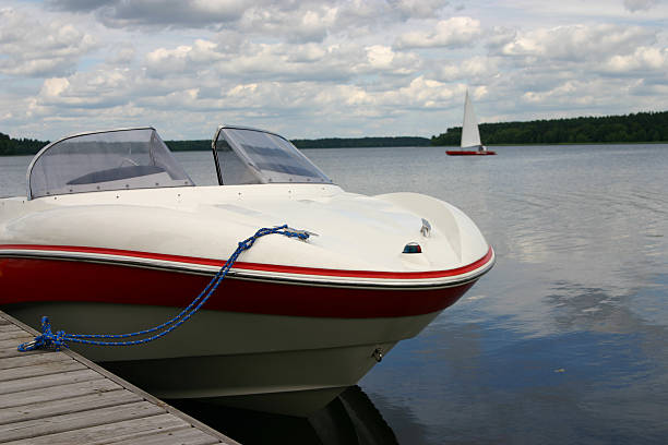 istock Motorboat and sailboat 182715893