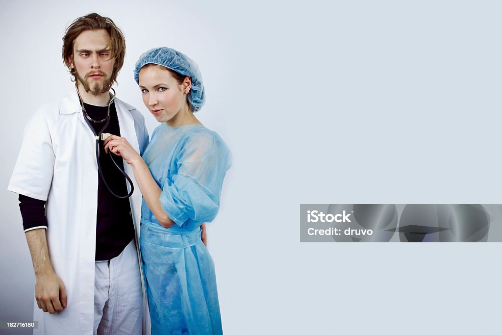Médico divertida pareja - Foto de stock de Abrigo libre de derechos
