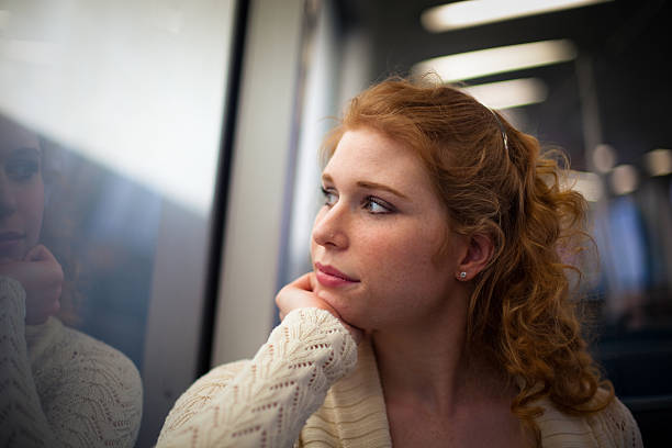 istock Girl Riding a Commuter Rail Train 182716198
