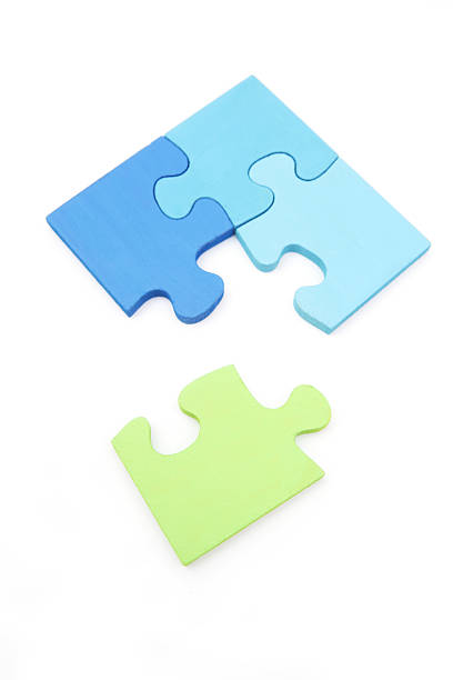 istock Green piece of a blue puzzle 182716955